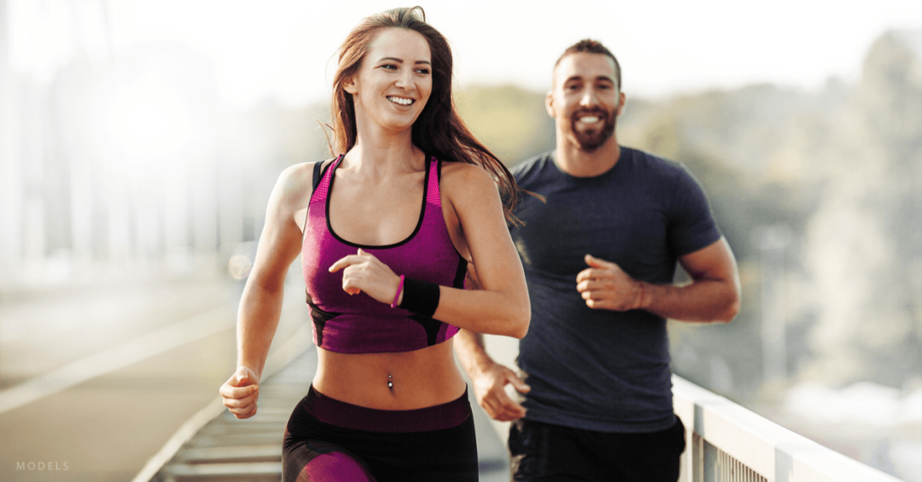 Woman and man running