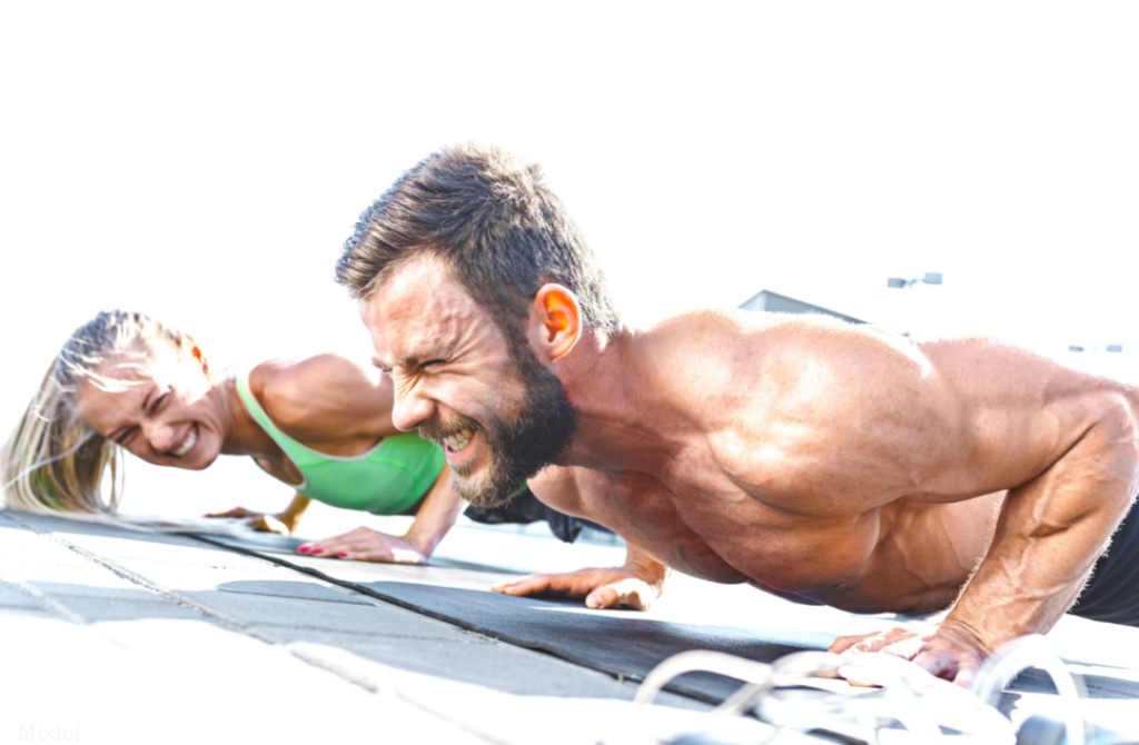 Energized man and woman working out together